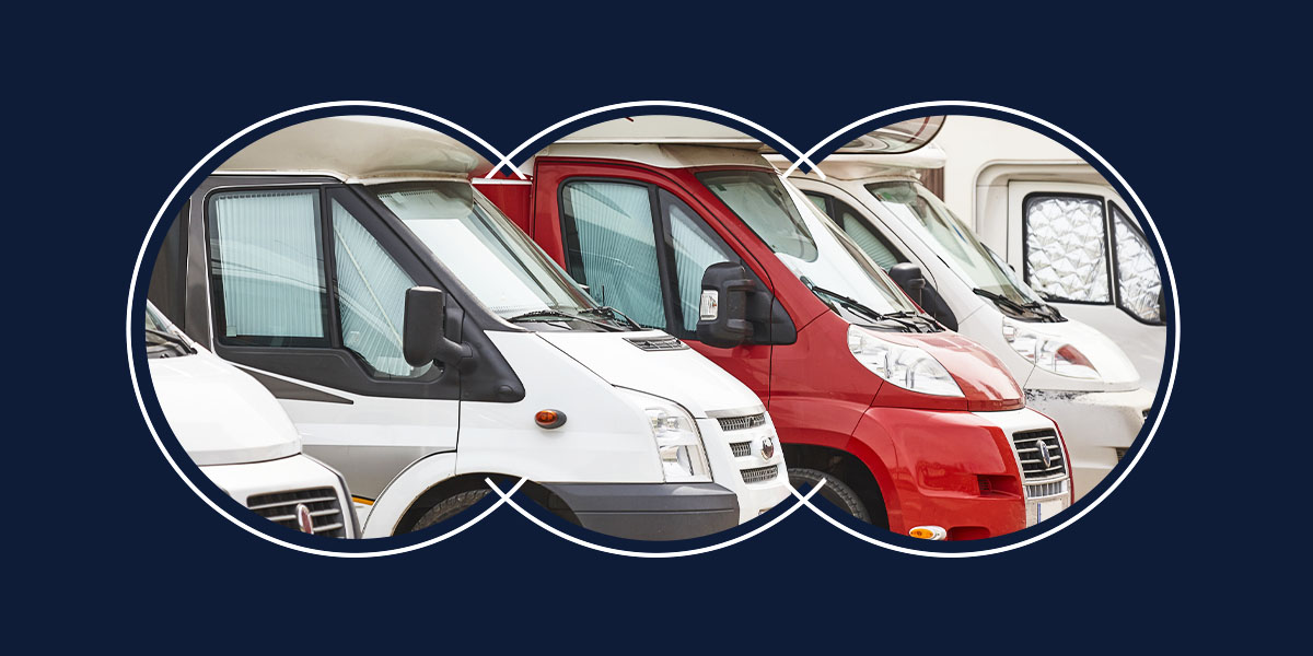 Four trailers with sun shades in the windows