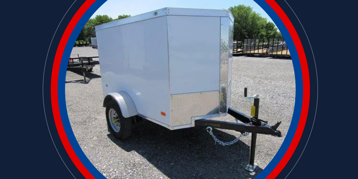 small white enclosed car trailer with 2 wheels
