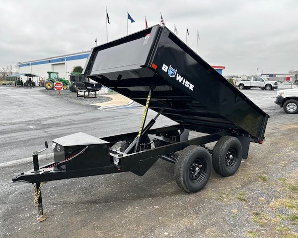 a dump trailer with the word bow wise on it
