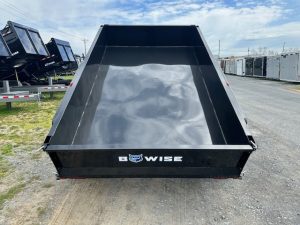 a black Bwise trailer sitting on the side of the road