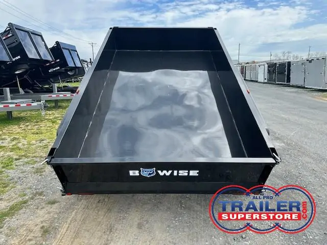 a black Bwise trailer sitting on the side of the road
