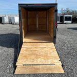 a Homesteader enclosed cargo trailer with the ramp door open