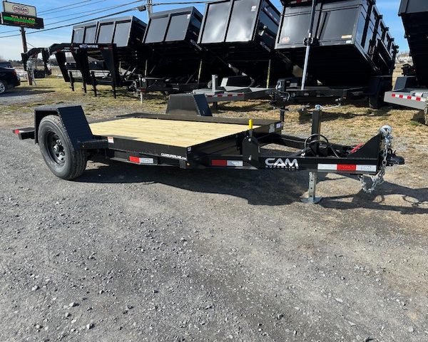 a CAM Superline trailer parked in a gravel lot