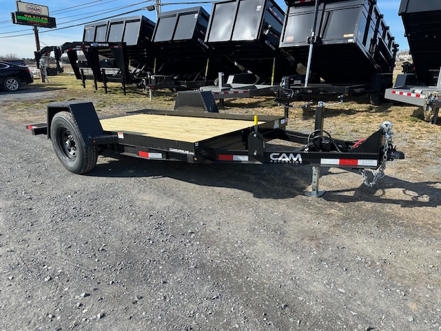 a CAM Superline trailer parked in a gravel lot