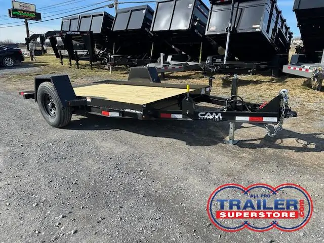 a CAM Superline trailer parked in a gravel lot