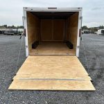 a Homesteader enclosed car trailer with ramp and side doors