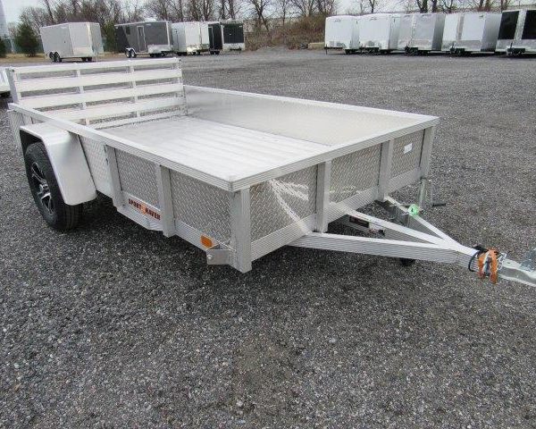 a white Sport Haven landscape utility trailer is parked in a lot