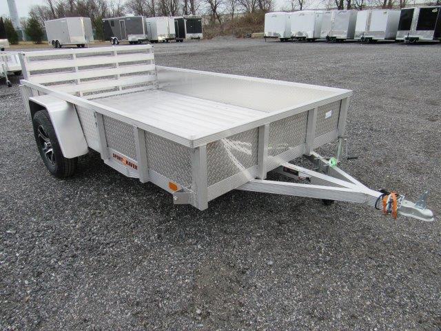 a white Sport Haven landscape utility trailer is parked in a lot