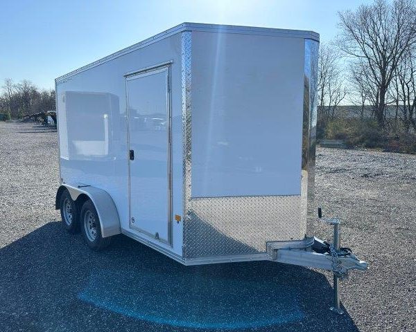 an enclosed CargoPro stealth trailer with aluminum V-nose and torsion axles