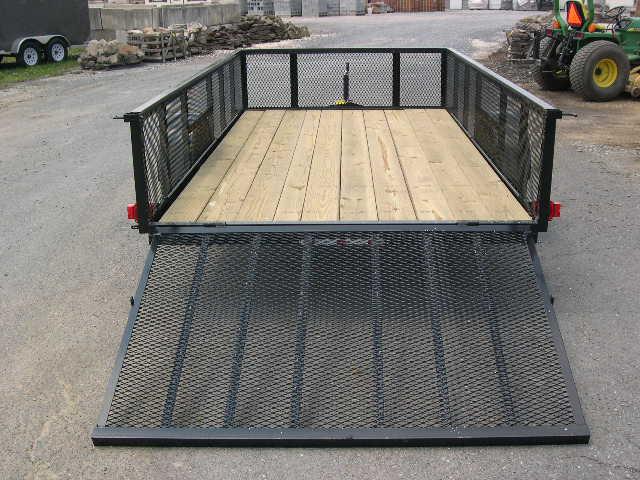 a landscape utility trailer with high mesh sides