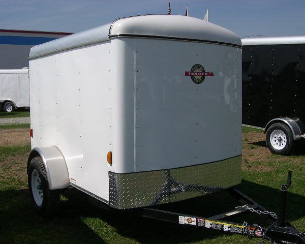 a white trailer with the word trailer on it