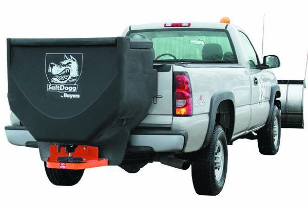 a white truck with a salt dog on the back