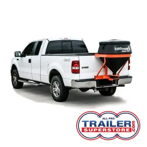 a white truck with a salt spreader attached to the back of it .