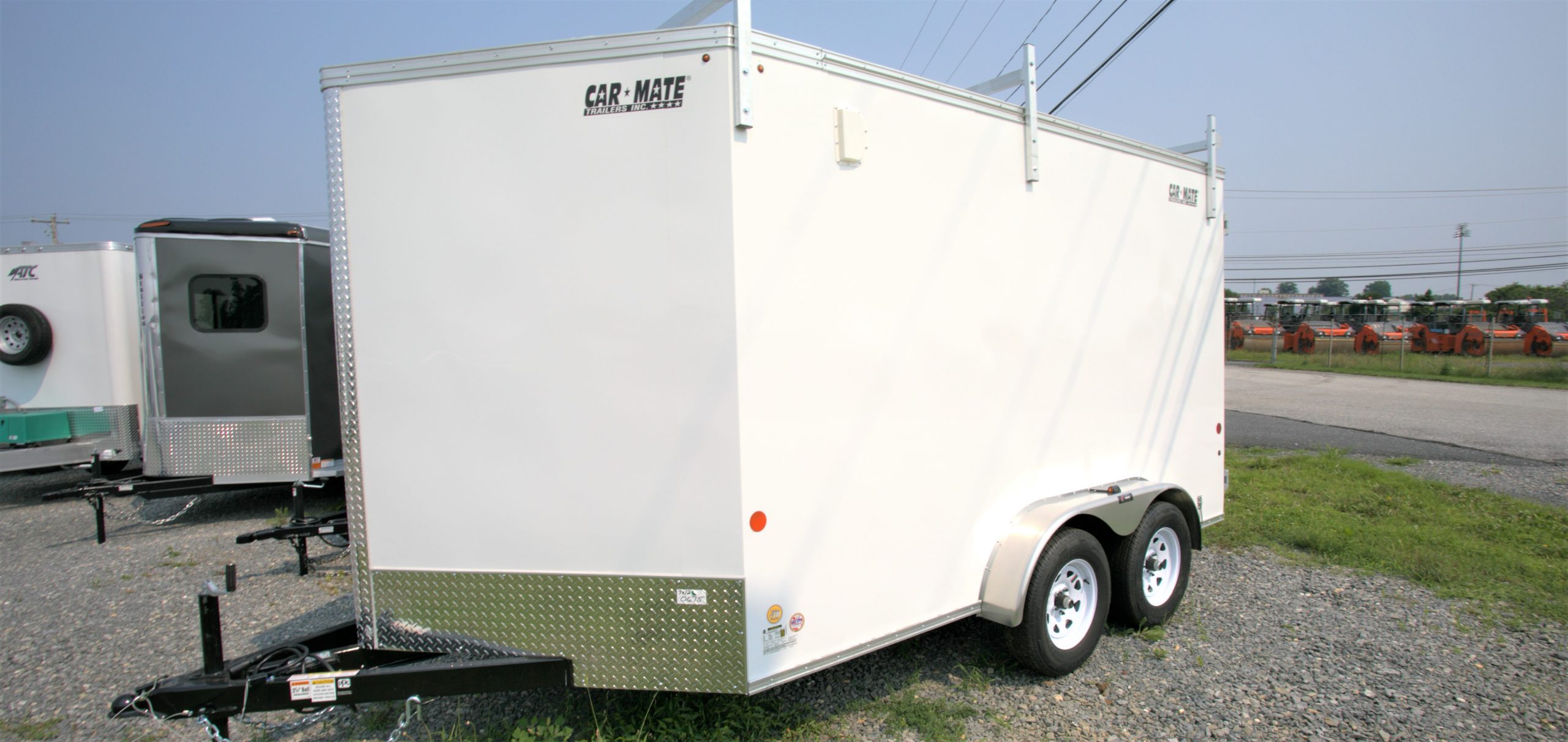 outside of Car Mate White trailer with V-nose