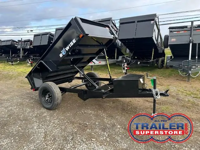 a dump trailer with the word be wise on it