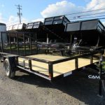 a CAM Superline trailer parked on the side of the road