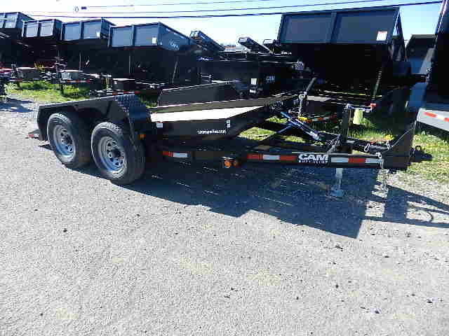 a dump trailer parked in a parking lot