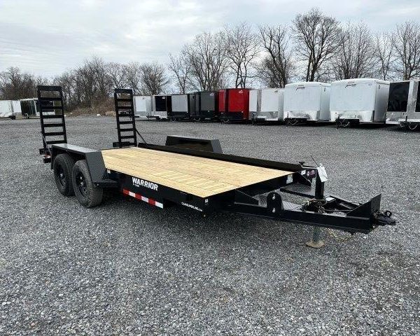a CAM Superline equipment trailer with ladder ramps
