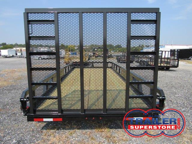 the back of a black trailer with a mesh fence