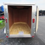 a Carry-On luggage trailer with a V-nose