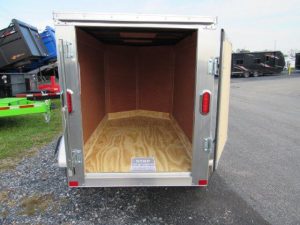 a Carry-On luggage trailer with a V-nose