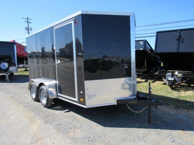 a 7x12 Covered Wagon with dual axles and side doors