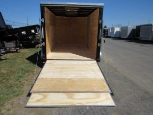 the back of a Covered Wagon trailer with the door open