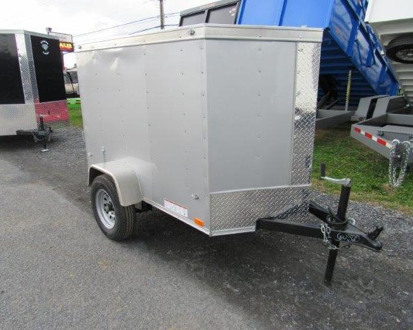 a Diamond Cargo trailer parked on the side of the road
