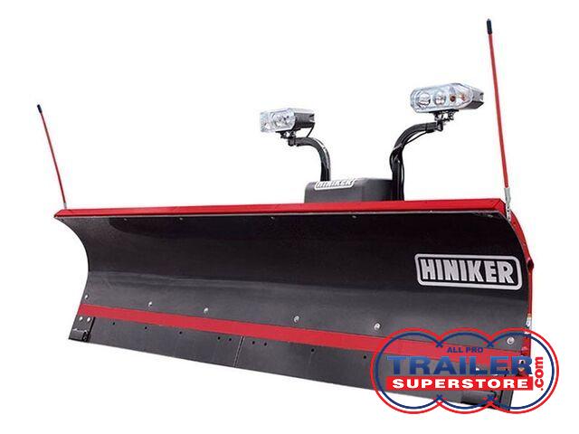 a hiniker snow plow with two lights attached to it