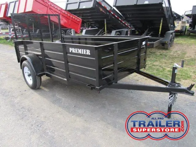 a black Premier landscape utility trailer with solid steel sides