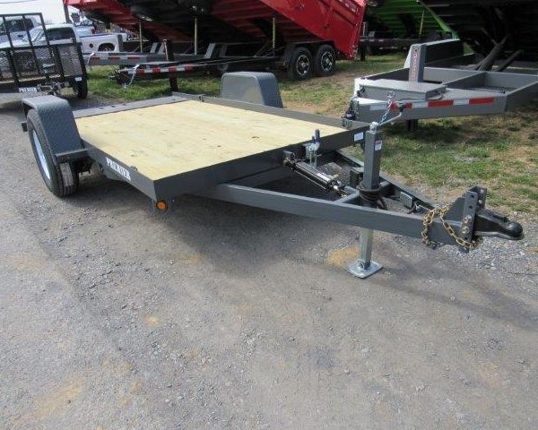 a Premier trailer with a wooden deck