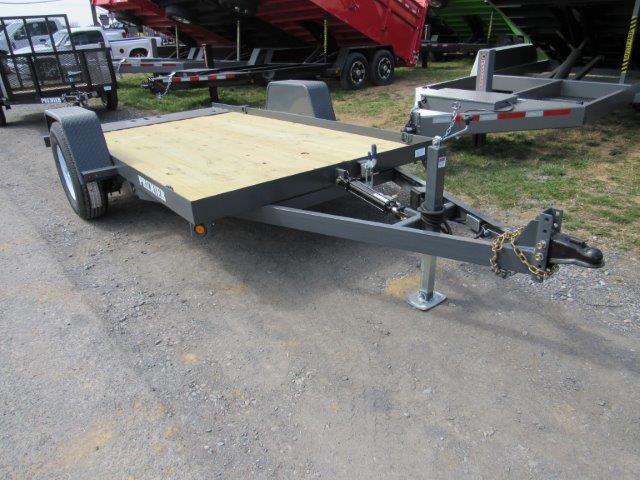 a Premier trailer with a wooden deck