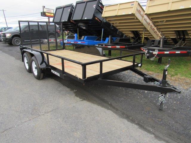 a premier trailer is parked on the side of the road