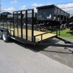 a Premier dual-axle utility trailer with a side ATV gate