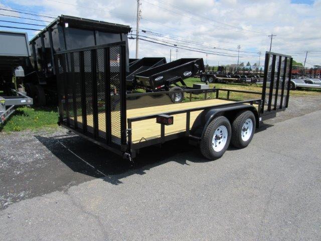 a black Premier dual axle utility trailer with side ATV gate