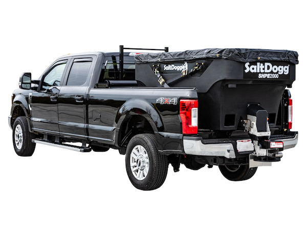 a black truck with a Salt Dogg SHPE2000 in the bed
