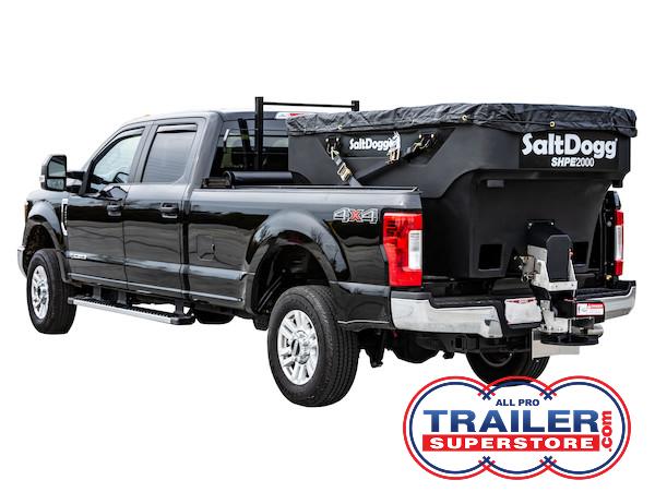 a black truck with a Salt Dogg SHPE2000 in the bed