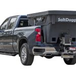a black truck with a salt dog on the back of it .