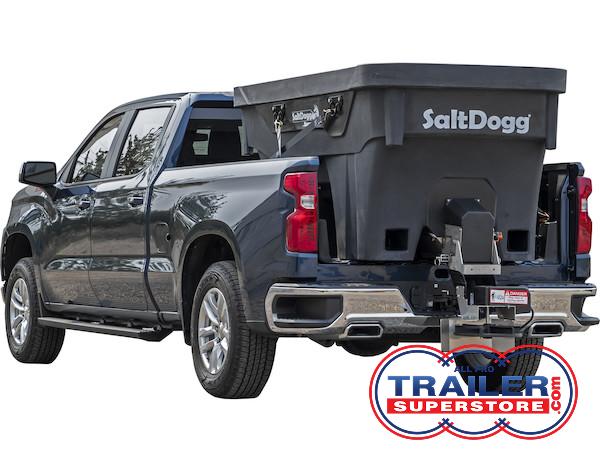 a black truck with a salt dog on the back of it .