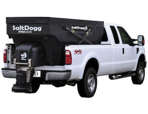 a white truck with a salt dogg pro 2000 on the back