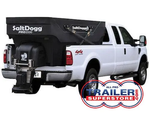 a white truck with a salt dogg pro 2000 on the back