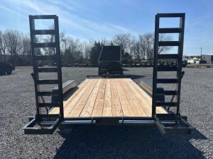 a BWise low profile equipment trailer with ladder ramps