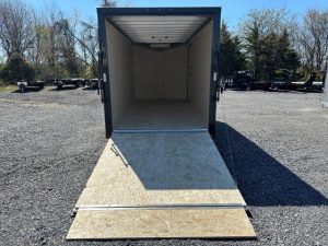 an ATC aluminum enclosed cargo trailer with black trim