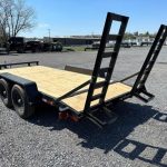 a Carry-On equipment trailer with ladder ramps