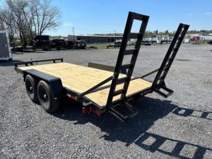 a Carry-On equipment trailer with ladder ramps