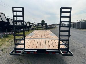 the back of a bwise trailer with a wooden deck