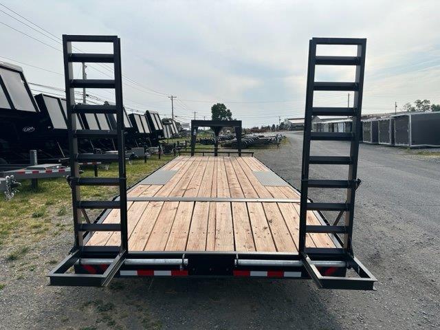 the back of a bwise trailer with a wooden deck