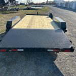 a CAM Superline open car trailer with a wood deck and aluminum wheels