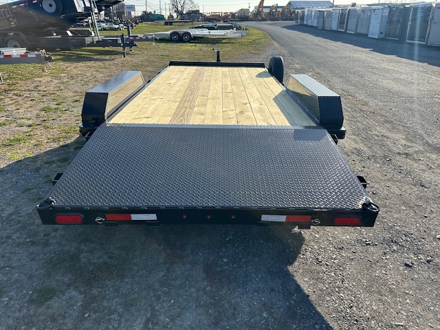 a CAM Superline open car trailer with a wood deck and aluminum wheels