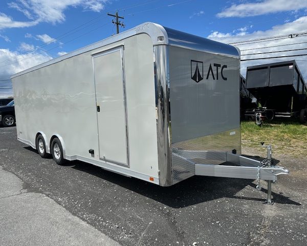 an ATC trailer parked on the side of the road